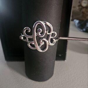 Silver-toned bangle bracelet "C"